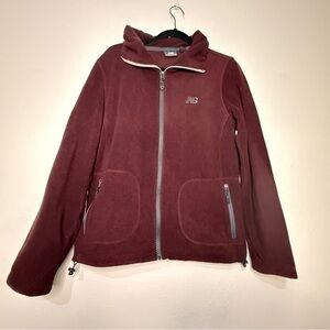 New Balance plum fleece zip front jacket, 2 zippered front pockets, Sz M.